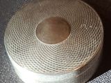 a roll of tape that is on a table