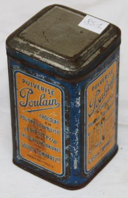 an old tin canister with a label on it