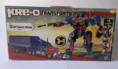 a box with a picture of a toy truck and a toy truck