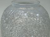 a glass vase that has a lot of bubbles in it