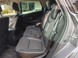 the back seats of a car are empty in the back of the car