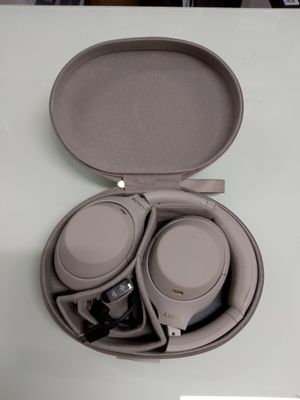 a pair of headphones sitting in a case on a table