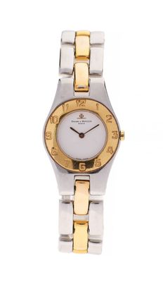 a close up of a wrist watch on a white background