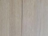 a close up of a piece of wood with a crack in it