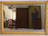 un miroir dans lequel on voit l'image d'une mère et de son enfant