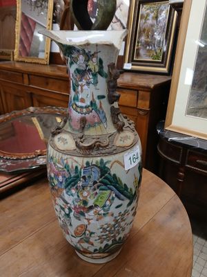 a vase that is sitting on a table in a room