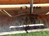 a picture of a close up of a bulldozer ' s front end