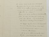 an old handwritten letter with a black ink writing on a piece of paper
