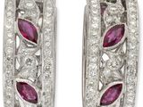 une paire de boucles d'oreilles créoles en rubis et diamants