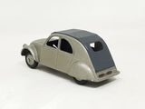 a toy car that is sitting on a white surface