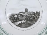 a plate with a picture of a building on it