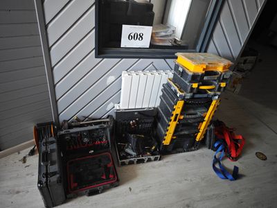 a lot of tools that are sitting on the floor