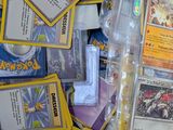 a lot of pokemon cards on the table