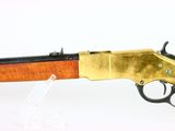 a close up of a rifle on a white surface with a white background