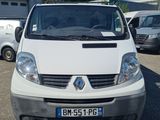 the white van is parked in a parking lot with other vehicles
