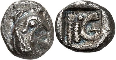 a silver coin with an image of a man and a woman on it