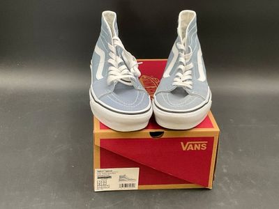vans old skooler high top sneakers in blue and white