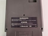 the back of a nintendo game case with a black label