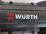 a close up of the wurth logo on the handlebar of a bicycle