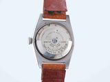 an image of a wrist watch with a brown leather strap