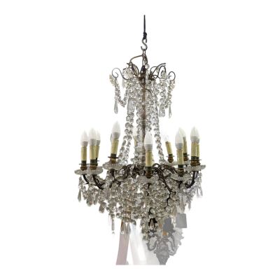 a chandelier that has five lights hanging from it