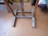 a picture of a wooden table with metal legs