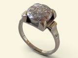 une image représentant une bague en argent sertie d'une pierre