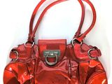 an image of a red purse on a white background