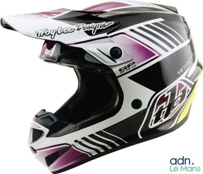 the helmet is black and white with a pink and yellow design on it