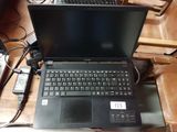 a laptop computer that is sitting on a table