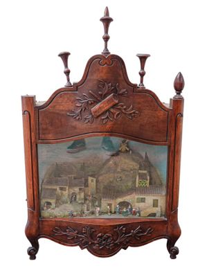 an image of a wooden frame with a picture of a town