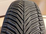 a close up of a tire on a white surface