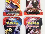 un lot de quatre cartes à collectionner Pokémon présentant différents motifs