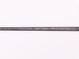 a sword that is laying on a white surface