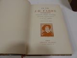 an open book with a picture of a man in a hat on it