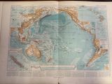 an open book with a map of the world on it