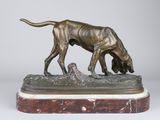 an image of a bronze dog statue on a marble base