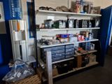 a shelf with many items on it in a room