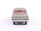 a toy car that is sitting on a white surface
