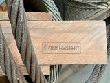 a close up of a bunch of wires and a wooden block