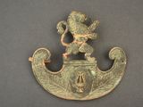 an image of a bronze plate with a lion on it