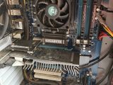 a computer that has a fan and a fan on top of it