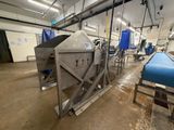 a large machine that is inside of a building