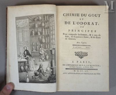 un livre ouvert sur lequel figure l'image d'un homme et d'une femme dans une cuisine