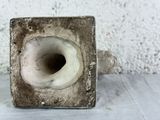 a small piece of concrete that is sitting on a table