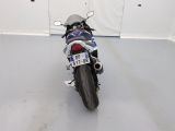 a motorcycle that is parked inside of a building