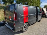 a van that is parked on the side of the road