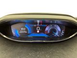 the dashboard of a car with a digital display on it