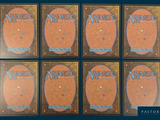 four decks of magic the gathering cards are shown on a blue background