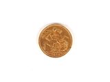 a gold coin with a picture of a horse on it